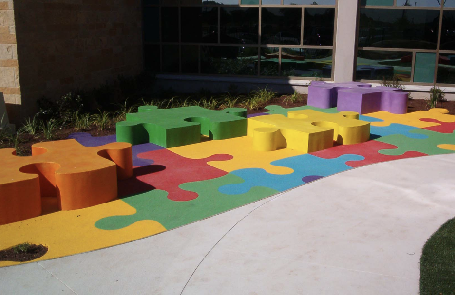 colorful puzzle pieces at the hospital entry
